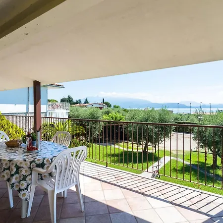 On Lake Garda With Pebble Beach Pier For Boat Three Swimming Pools *