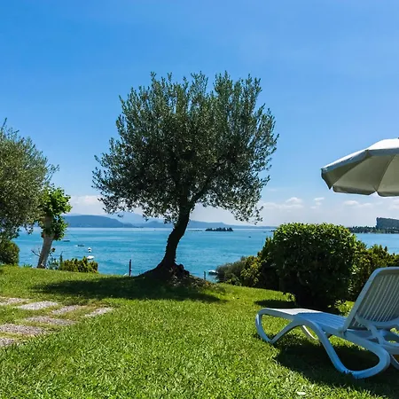 On Lake Garda With Pebble Beach Pier For Boat Three Swimming Pools *